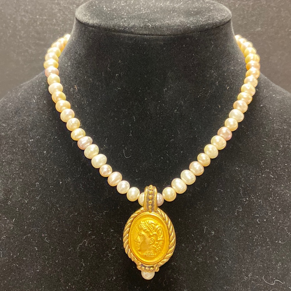 Real various shades pearl necklace w removable costume pendant. 16” L necklace.